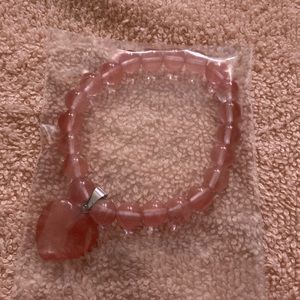 Pink bracelet. Beautiful color. Color looks different, but the same.